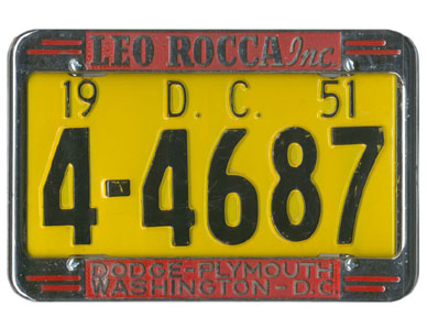 1951 auto plate no. 4-4687 in a chrome advertising frame of Leo Rocca Dodge-Plymouth