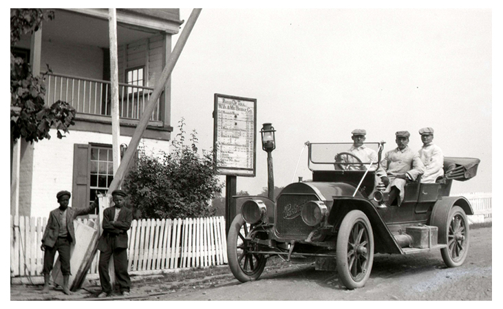 Touring car stopped at the toll station for a bridge across the Potomac River between Maryland and West Virginia.