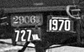 Maryland, Virginia, and District of Columbia license plates on rear of Speedway automobile