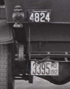 Close image of license plates from scene above.